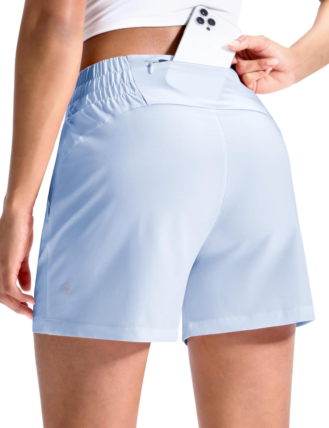 image:imageMIER Running Shorts for Women Quick Dry Mid Waisted Athletic Workout Gym Shorts with Mesh Liner 4 Inch Inseam 3 PocketsLight Blue
