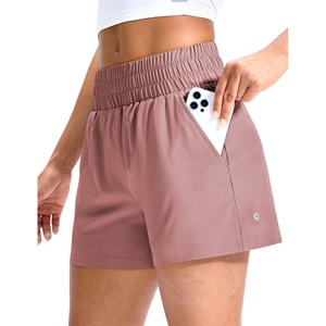 image:imageMIER Running Shorts for Women Quick Dry Mid Waisted Athletic Workout Gym Shorts with Mesh Liner 4 Inch Inseam 3 PocketsDusty Pink