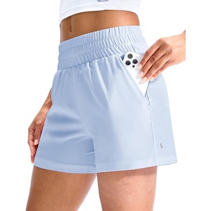 image:imageMIER Running Shorts for Women Quick Dry Mid Waisted Athletic Workout Gym Shorts with Mesh Liner 4 Inch Inseam 3 PocketsLight Blue