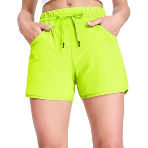 image:imageMIER Womens Running Shorts Quick Dry Athletic Workout High Waisted Active Shorts with Liner Zipper Pocket 4 InchNeon Green